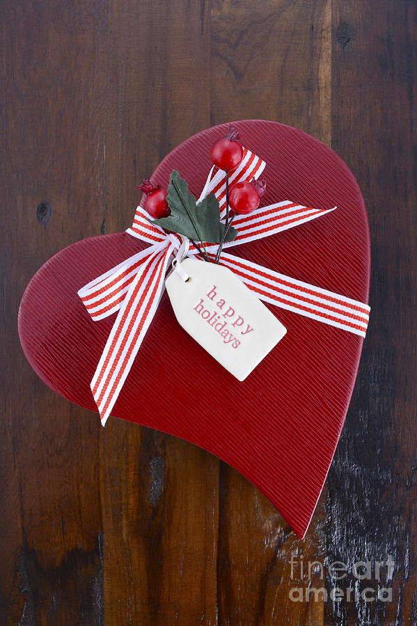 Vintage style red heart shape Christmas gift Photograph by Milleflore Images