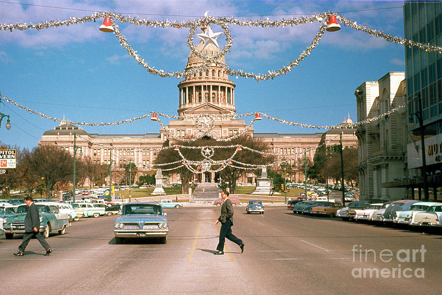 Vintage Photograph - Vintage view of the Texas State Capitol and Christmas decorations strung along Congress Avenue from December 1960 by Dan Herron