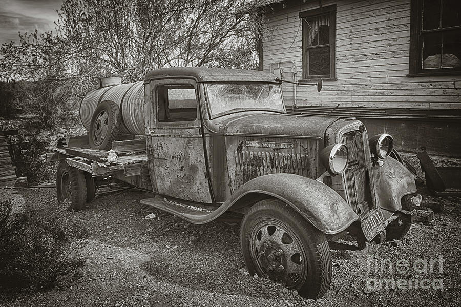 Vintage Water Truck in Black and White Photograph by Priscilla Burgers
