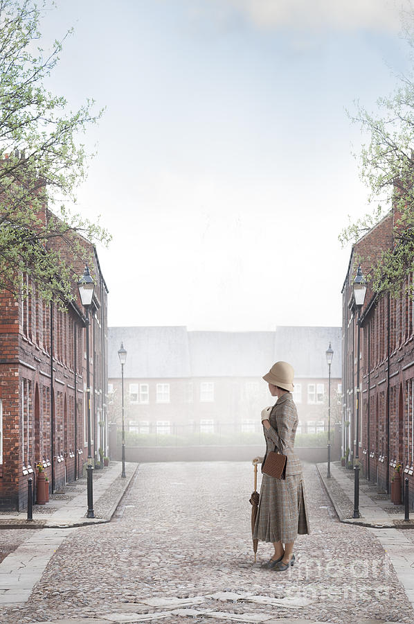 Vintage Woman With Cloche Hat Standing On A Cobbled Street Photograph by Lee Avison