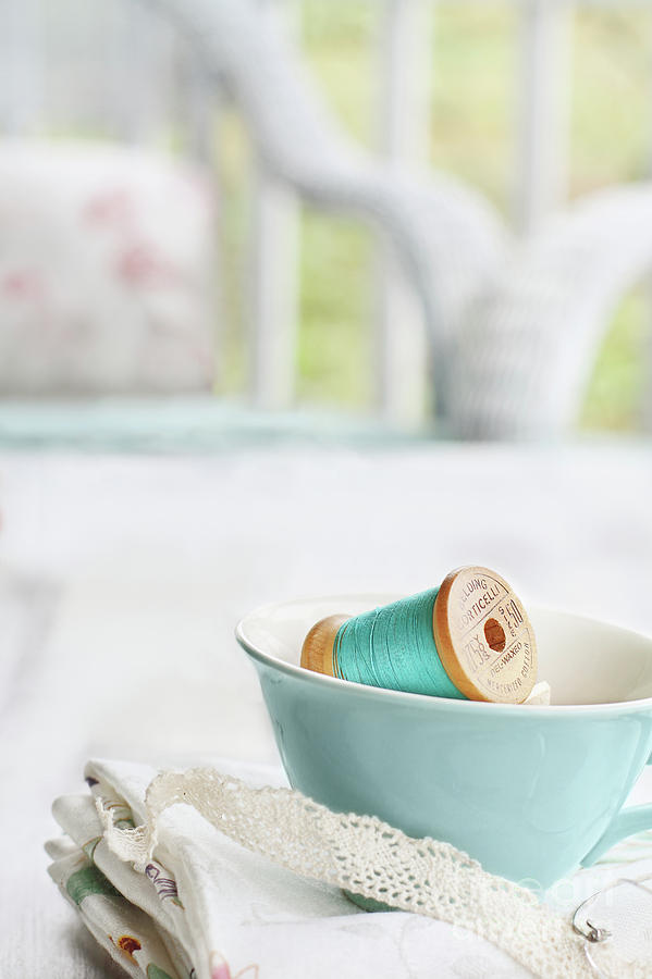 Vintage Wooden Spools of Thread in Vintage Tea Cup Photograph by Stephanie Frey