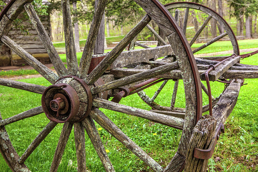 Vintage Wooden Wagon Wheel at Mabry Mill Photograph by Dan Carmichael