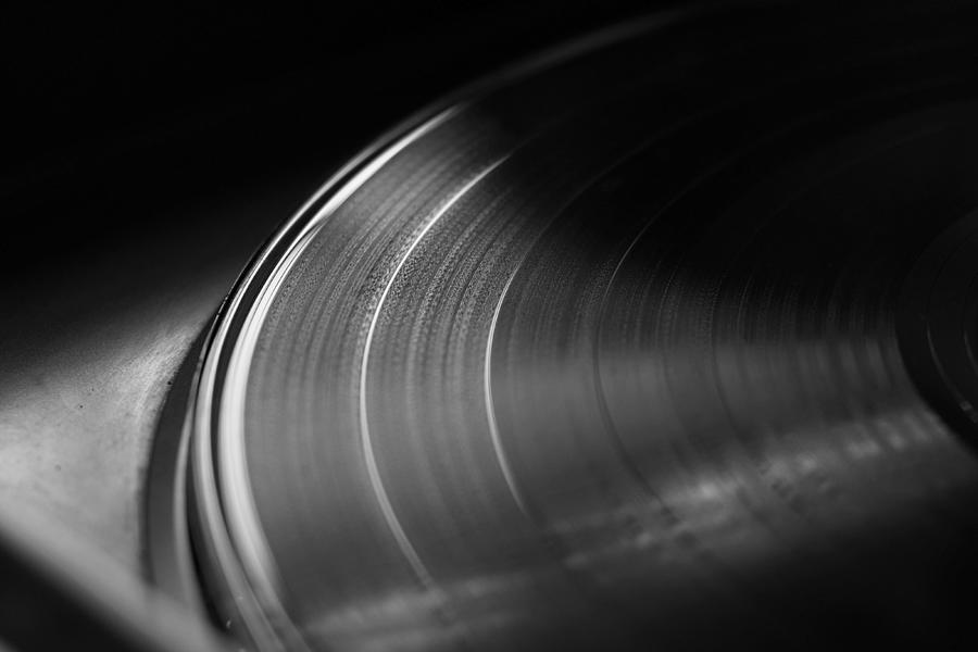 Black And White Photograph - Vinyl Record and Turntable by Angelo DeVal
