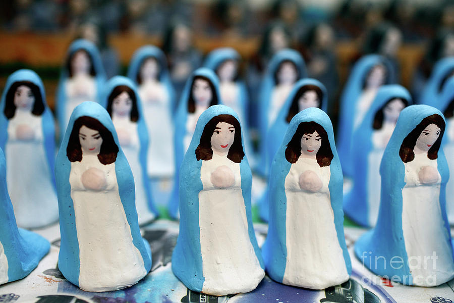 Christmas Photograph - Virgin Mary figurines by Gaspar Avila