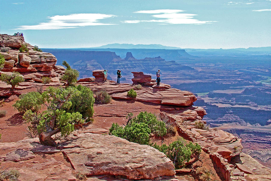 Visitors on the Canyon Rim of Dead Horse Point in Dead Horse Point State Park, Utah Photograph by Ruth Hager