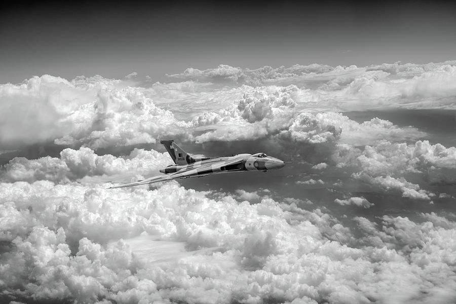 Vulcan and towering clouds BW version Photograph by Gary Eason