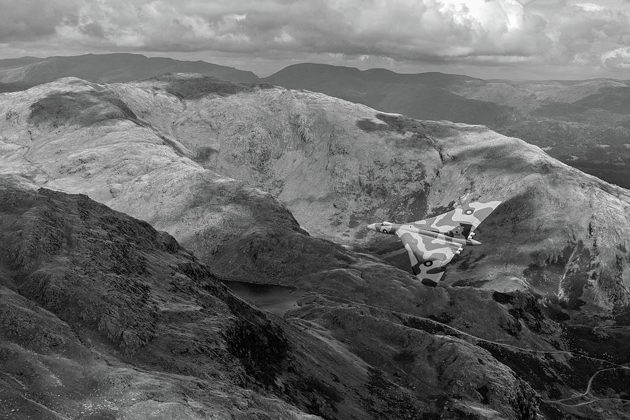 Vulcan low-level in the Lakes BW version Photograph by Gary Eason