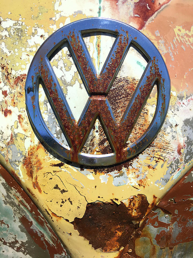 VW Volkswagen Emblem with Rust Photograph by Kelly Hazel