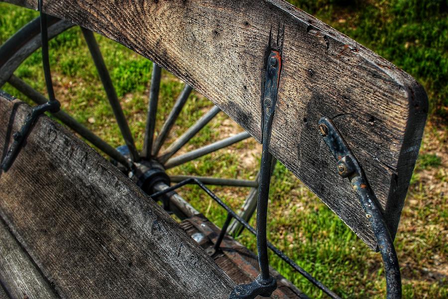Wagon Seat and Wheel Photograph by Buck Buchanan