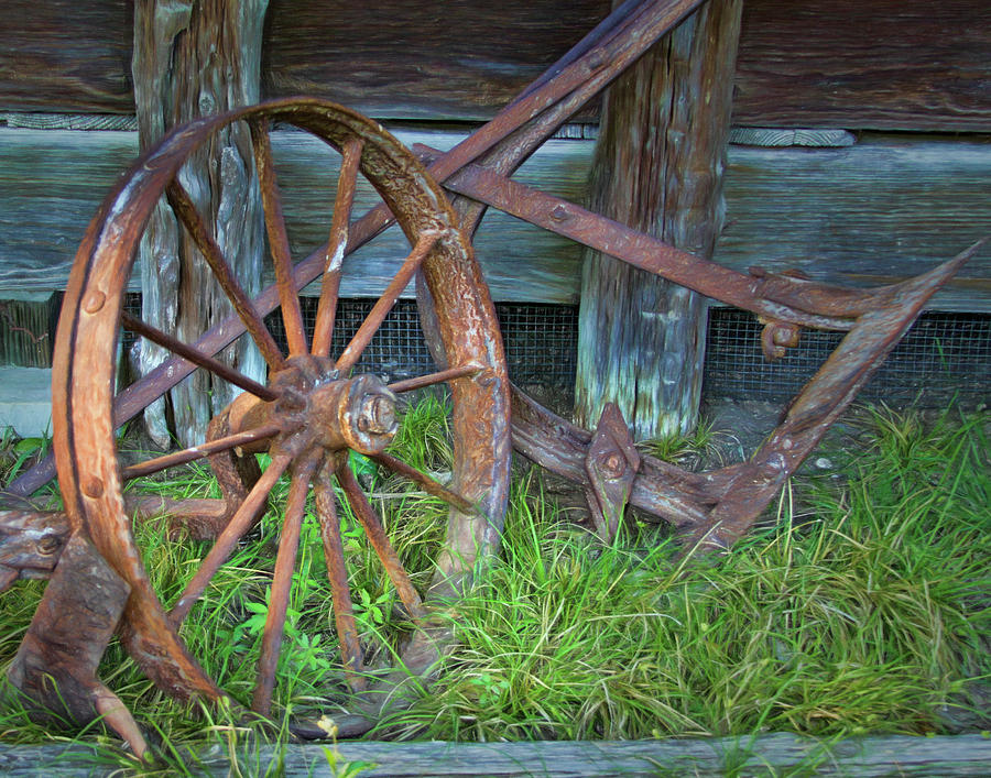 Wagon Wheel and Fence Photograph by David and Carol Kelly