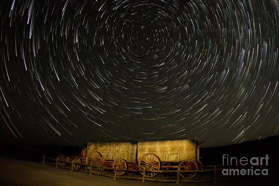 Wagon Wheel In The Sky Photograph by Mark Jackson