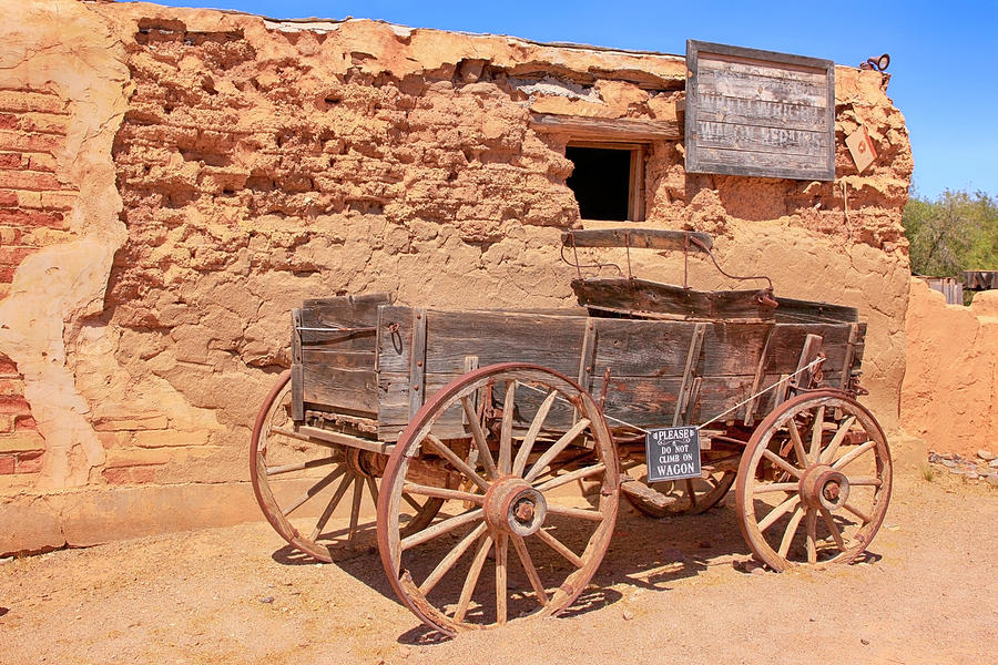 Wagon Wheels in Tucson Photograph by Chris Smith