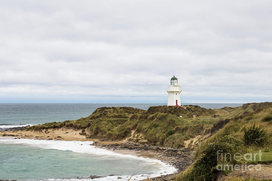 Waipapa Point Lighthouse in New Zealand Photograph by Didier Marti