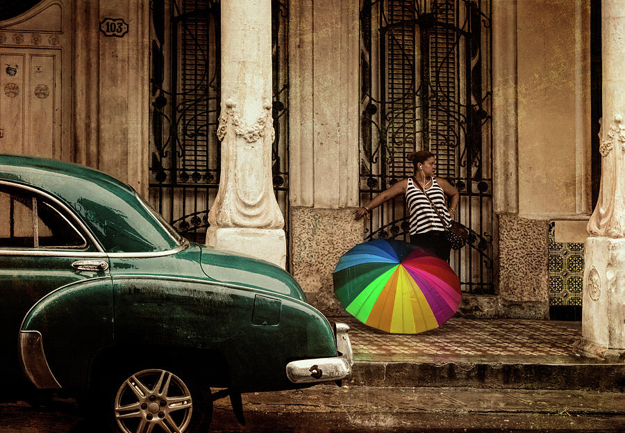 Waiting Out The Rain in Havana Cuba Photograph by Joan Carroll