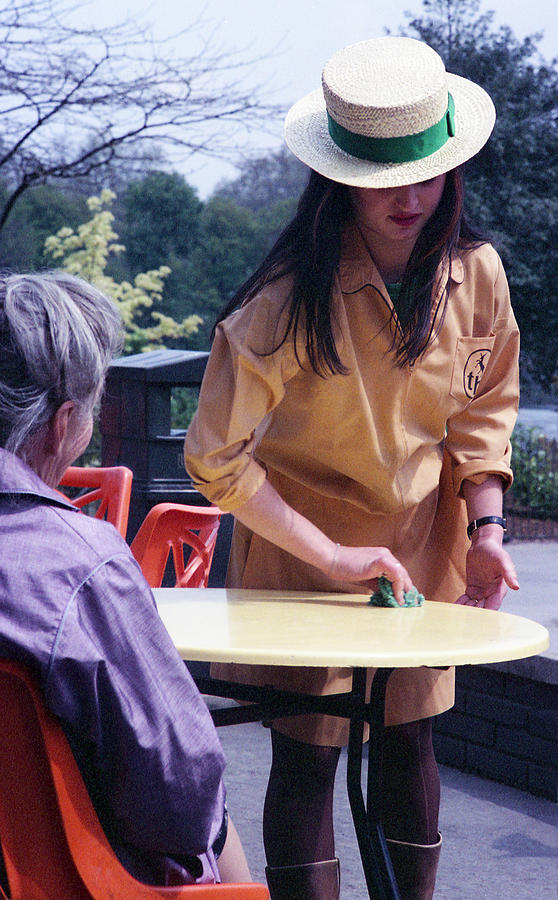 Waitress in Boater Hat Photograph by Nancy Clendaniel