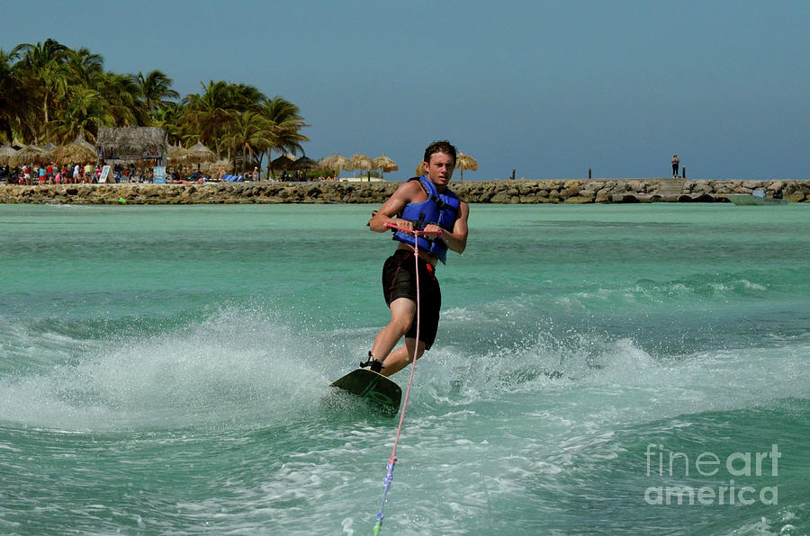 Wakeboarder Carving and Turning on a Wakeboard in Aruba Photograph by DejaVu Designs