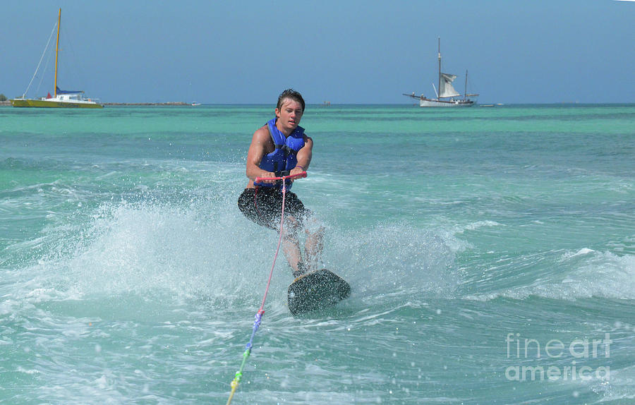 Wakeboarder Landing a Jump with a Big Splash in Aruba Photograph by DejaVu Designs