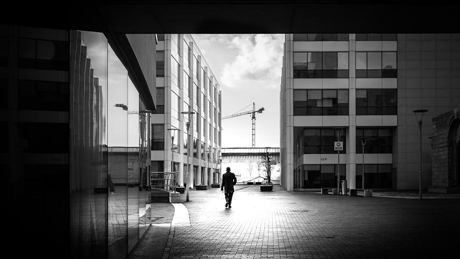 Walking alone - Dublin, Ireland - Black and white street photography Photograph by Giuseppe Milo