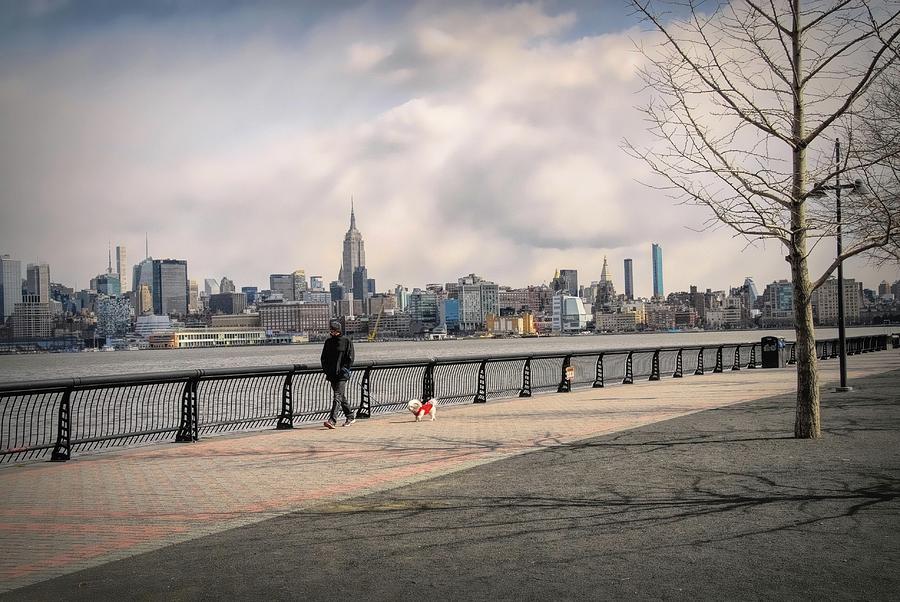 Walking Along Hobokens Hudson River Waterfront Walkway Photograph by Dyle Warren