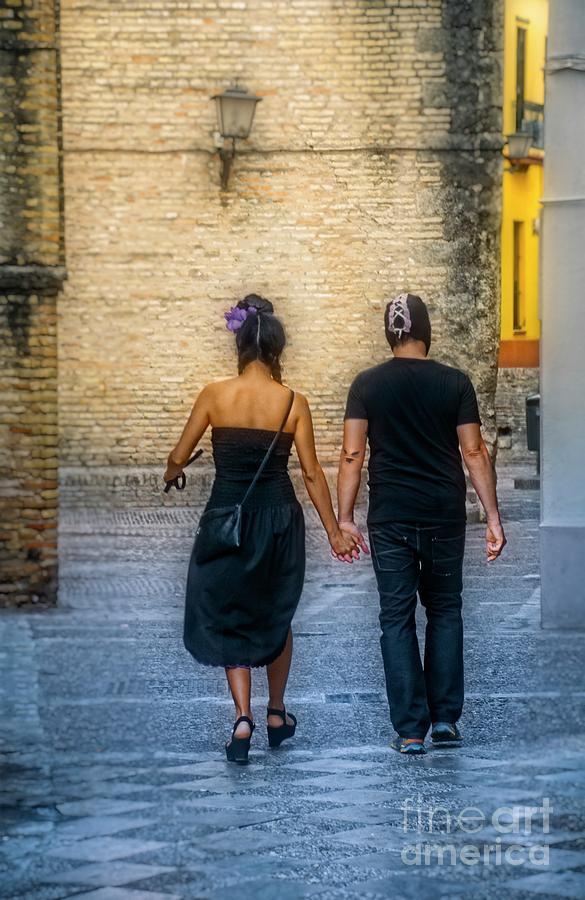 Walking Hand in Hand - Seville Photograph by Mary Machare