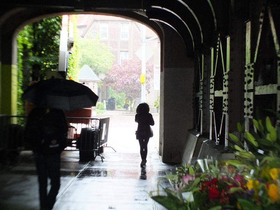 Walking in The rain under the Elevated Train Photograph by Nicholas Small