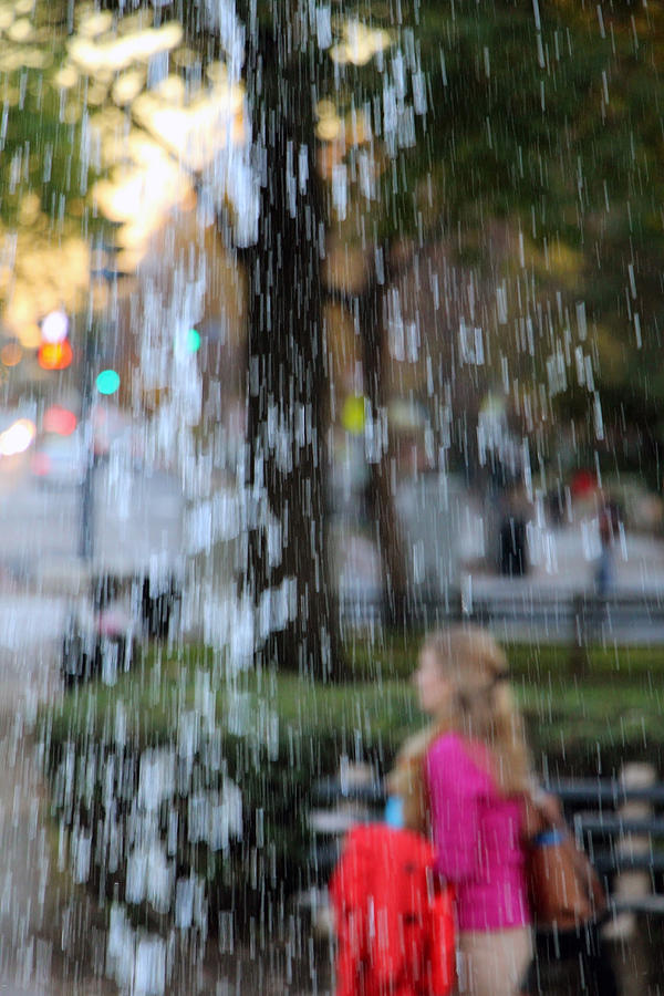 Walking Past A Fountain Photograph by Cora Wandel