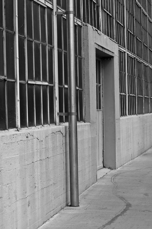 Warehouse Black and White Windows and Doors Photograph by Wilma  Birdwell