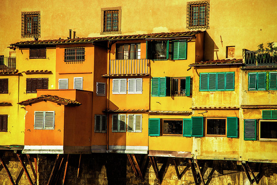 Warm Glow on the Ponte Vecchio Photograph by Andrew Soundarajan
