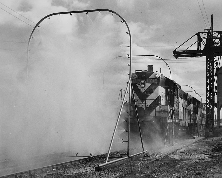 Washing Diesel Engine 1715 - 1957 #1 Photograph by Chicago and North Western Historical Society
