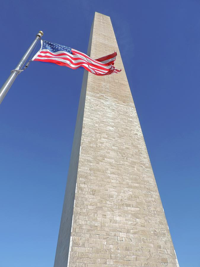 Washington Monument And Us Flag Photograph
