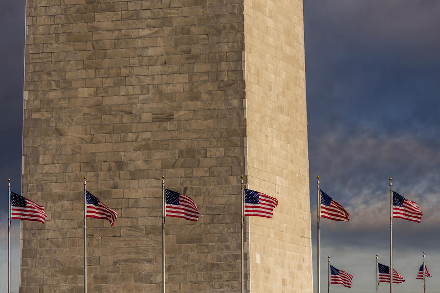 Washington Monument And USA Flags Photograph by Susan Candelario