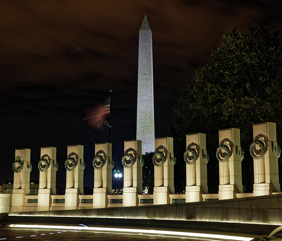 Washington Monument from the WWII Monument at night Photograph by Doolittle Photography and Art