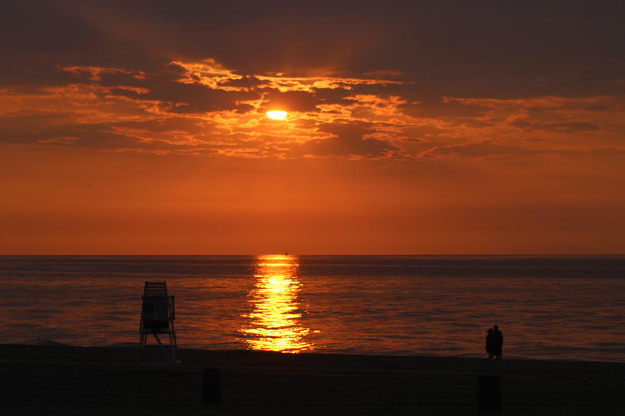 Watching An Orange Sunrise Photograph by Robert Banach