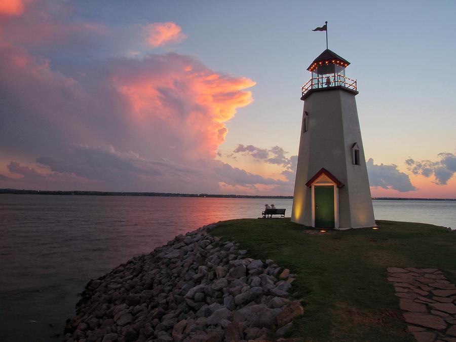 Watching Sundown at the Lighthouse  Photograph by Buck Buchanan