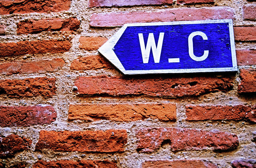 Brick Photograph - Water closet sign on a brick red wall by Sami Sarkis
