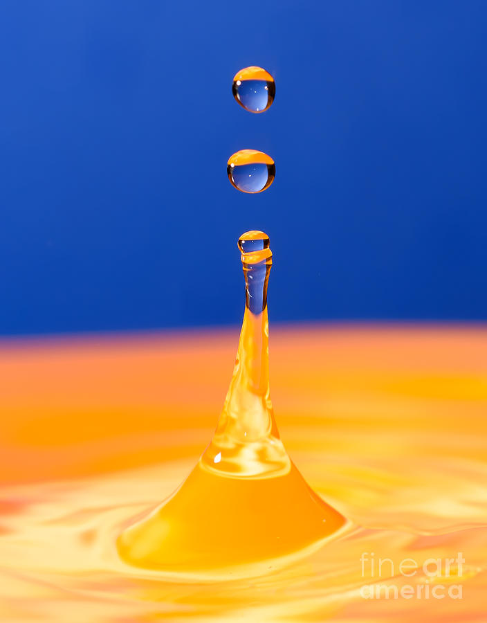 Water drop and splash Photograph by Colin Rayner