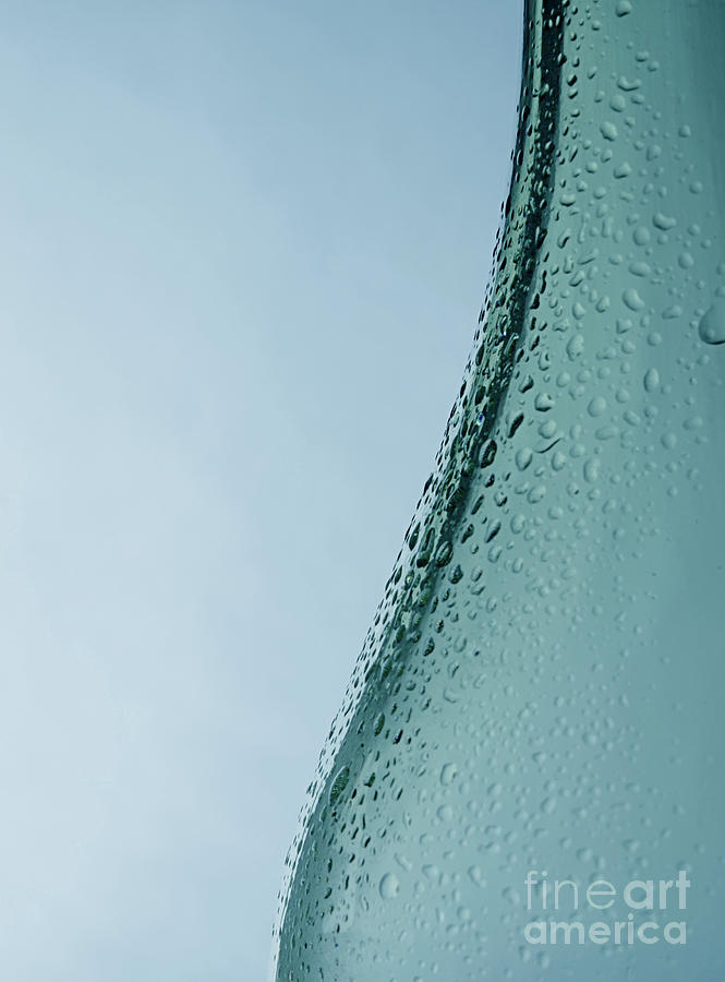 Water dropslets on a bottle Photograph by Andreas Berheide