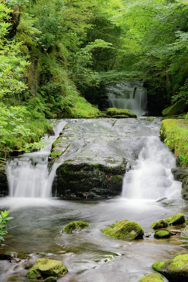 Water falling Photograph by Warren Bourne