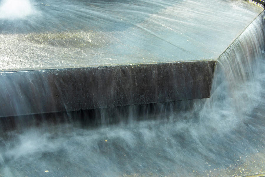 Water Flowing In City Fountain Photograph