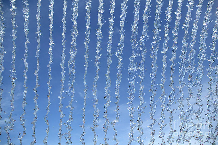 Water Fountain Against Blue Sky Photograph by Gerard Lacz