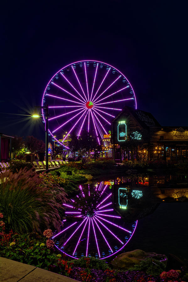 Water Moonshine and a Big Wheel Photograph by Greg and Chrystal Mimbs