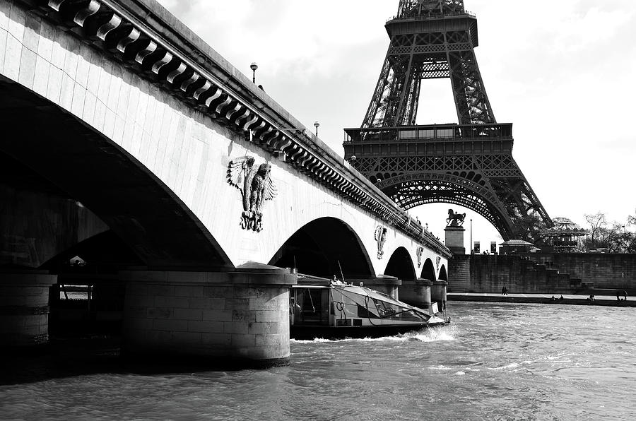 Water Taxi Boat Under Pont dLena Bridge with Eiffel Tower Paris France Black and White Photograph by Shawn OBrien
