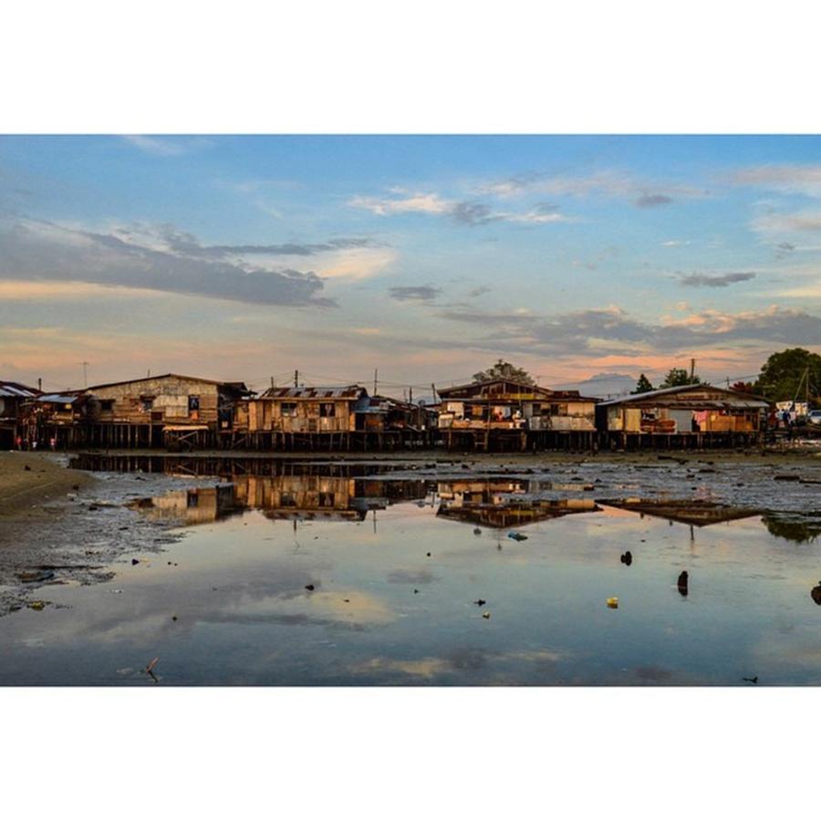 Water Village Photograph by Michael Anthony Villahermosa