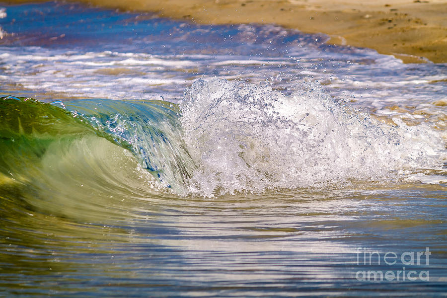 Wave crashing on the shore Photograph by Claudia M Photography