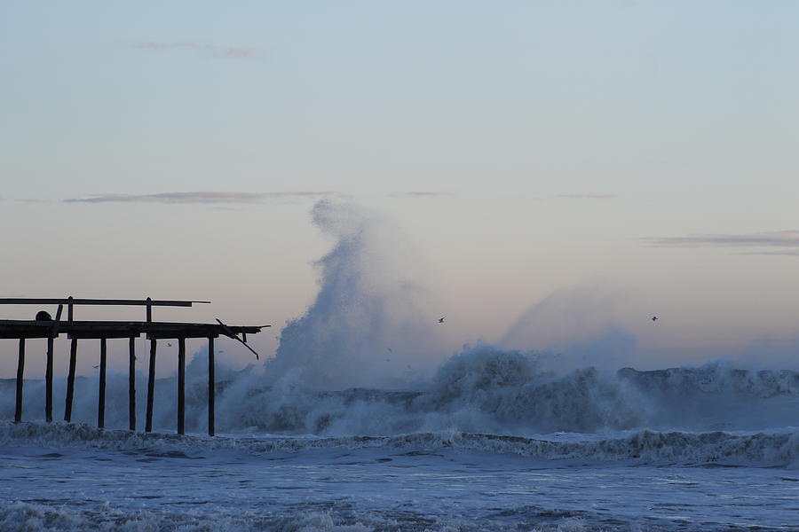 Wave Towers Over OC Fishing Pier Photograph by Robert Banach