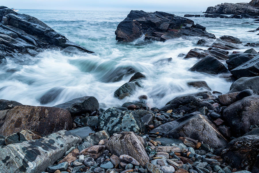 Waves Against a Rocky Shore Photograph by Doug Camara