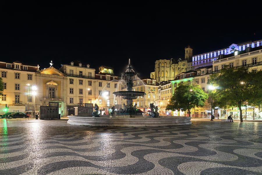 Waves and Lights - Rossio Square in Lisbon Portugal at Night Photograph by Georgia Mizuleva