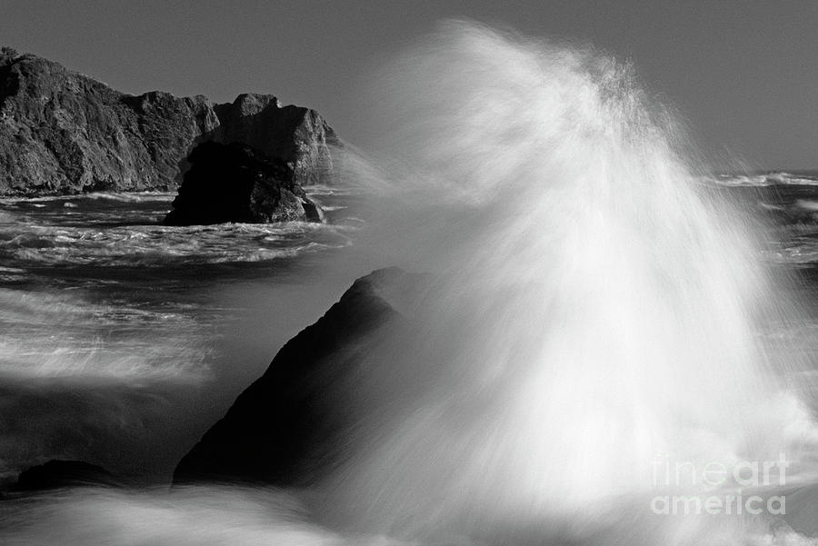 Waves breaking over Rocks Photograph by Jim Corwin