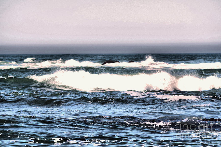 Waves coming inward Photograph by Jeff Swan