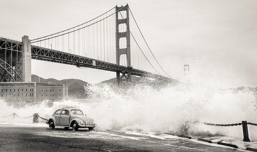 Waves Crash over a Vintage Beetle in Front of the Golden Gate Bridge San Francisco California BW Photograph by Richard Kimbrough